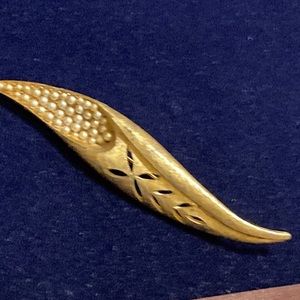 BSK Vintage stamped gold tone cut out pin with seed pearls